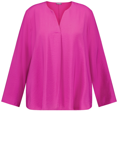 Fein schimmernde Bluse