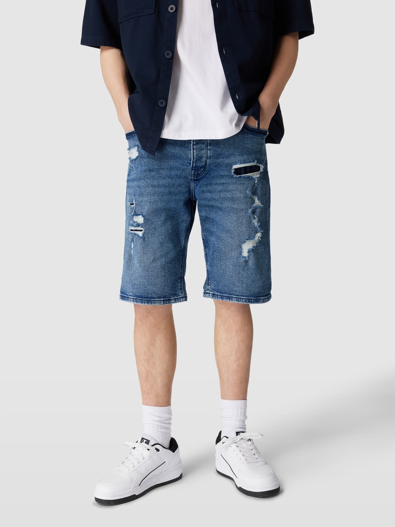 Jeansshorts im Destroyed-Look in blau