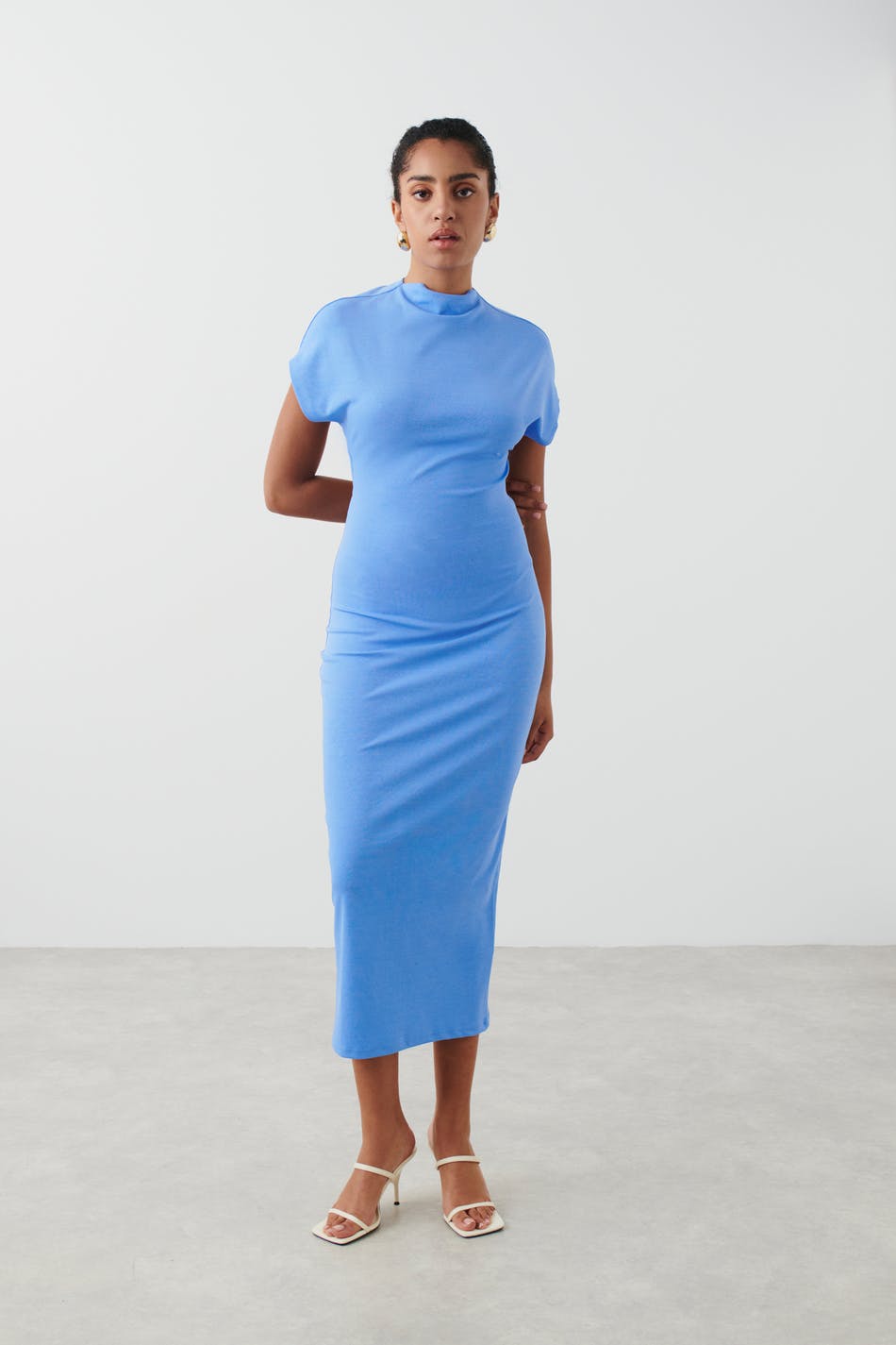 Open back funnel neck dress