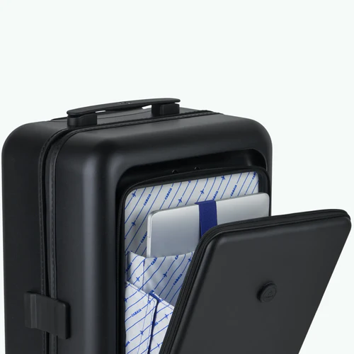 ORLY 4-wheel hard-shell suitcase with MAD black pouch