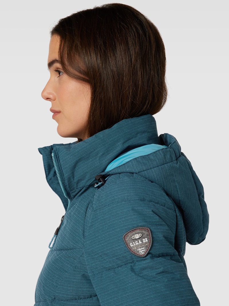 Steppjacke in Überlänge in petrol