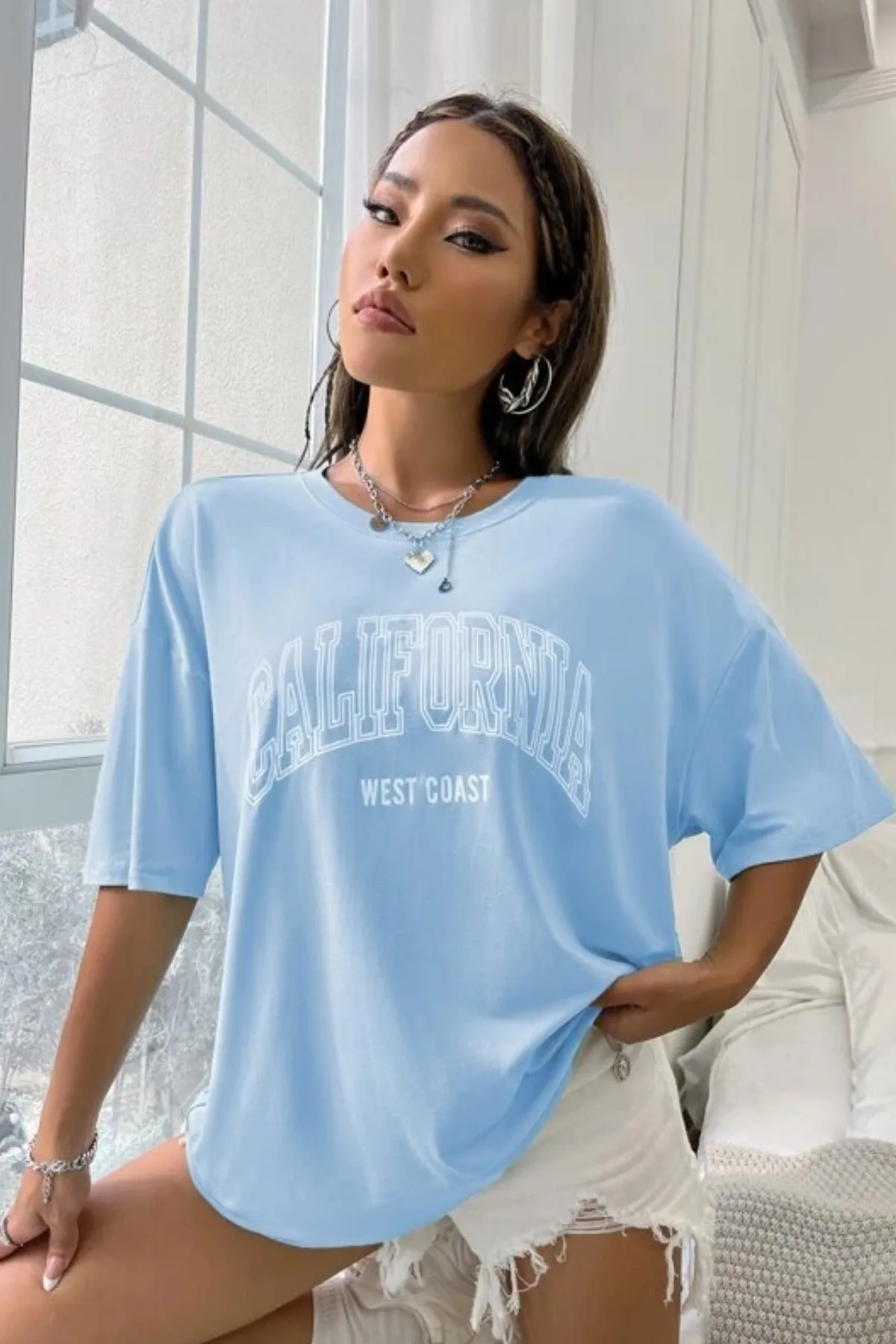 MODAGEN  Unisex-T-Shirt in Babyblau mit Aufdruck „California West Coast“ in Übergröße