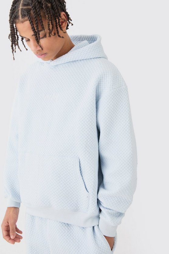 Kastiger Oversize Trainingsanzug mit Jacquard-Stickerei und Kapuze