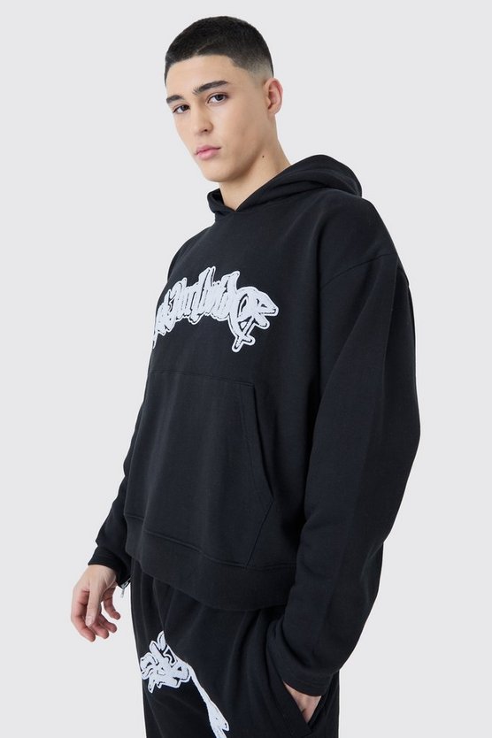 Kastiger Oversize Hoodie mit Applikation und Reißverschluss