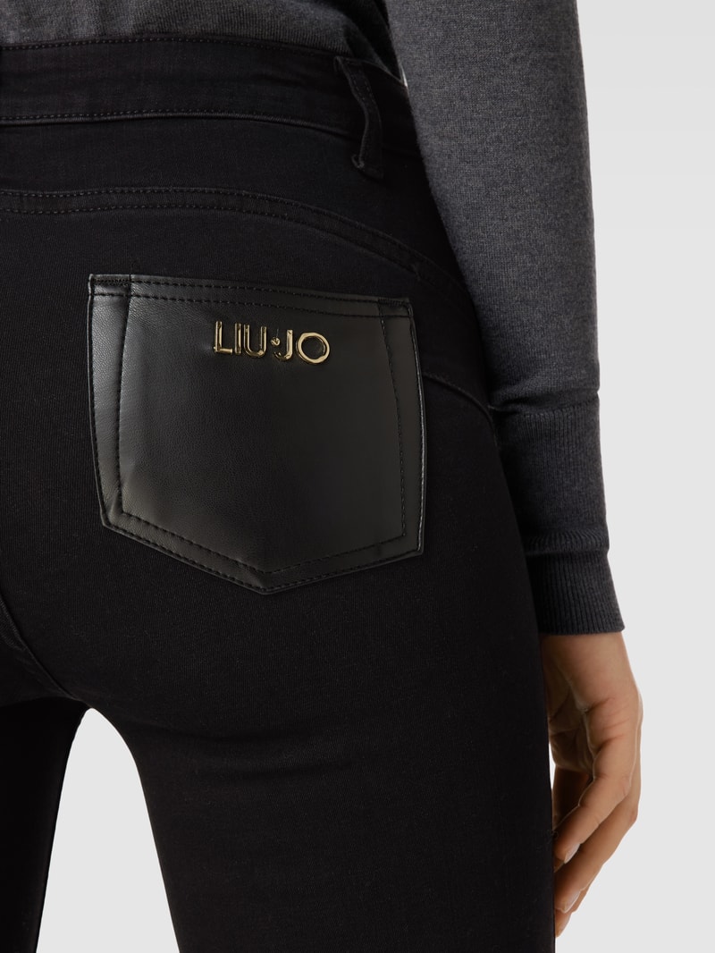Slim Fit Jeans im 5-Pocket-Design Modell 'DEVINE' in schwarz