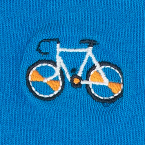 On a blue bicycle