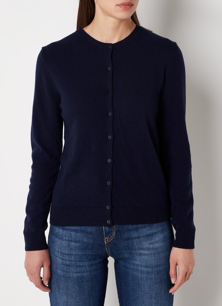 Cardigan Benetton cu guler rotund, confecționat din lână fină.