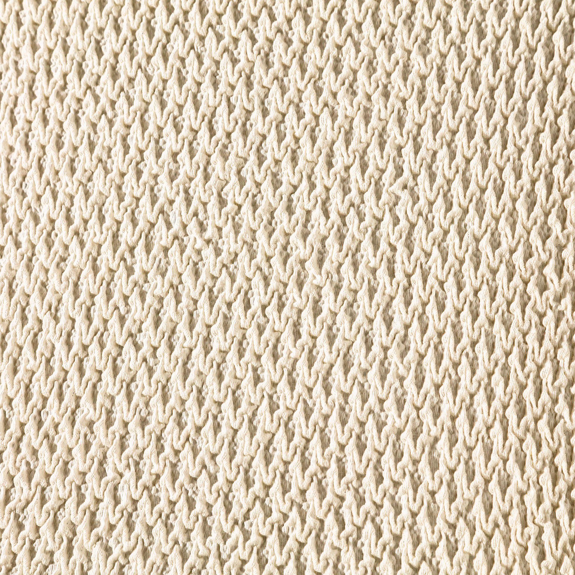 Housse texturée bi-extensible spéciale canapé fauteuil à accoudoirs
