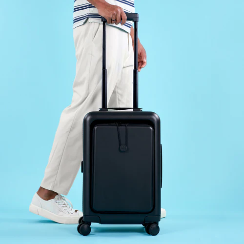 ORLY 4-wheel hard-shell suitcase, plain black pouch