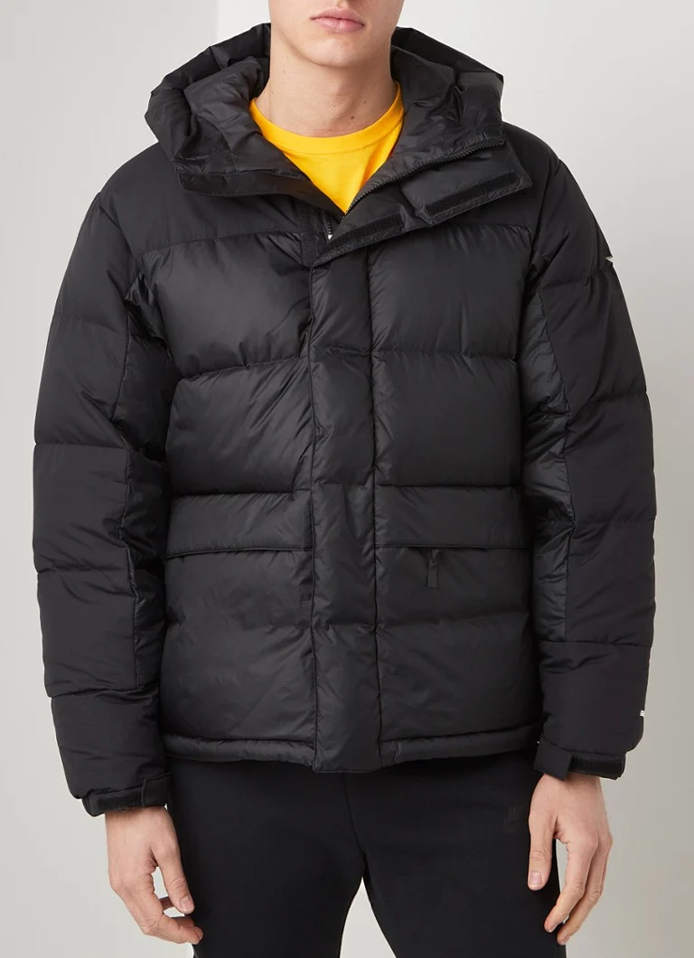 Jaqueta puffer The North Face Himalayan com enchimento de plumas e capuz.