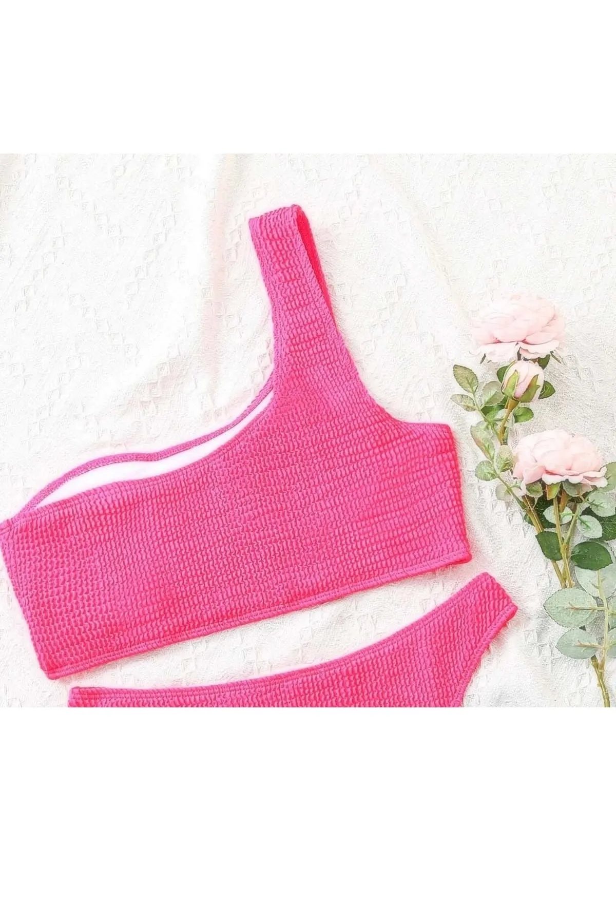 Angelsin  Aria&'s Closet Spezielles Bikinioberteil aus geripptem Stoff in Rosa