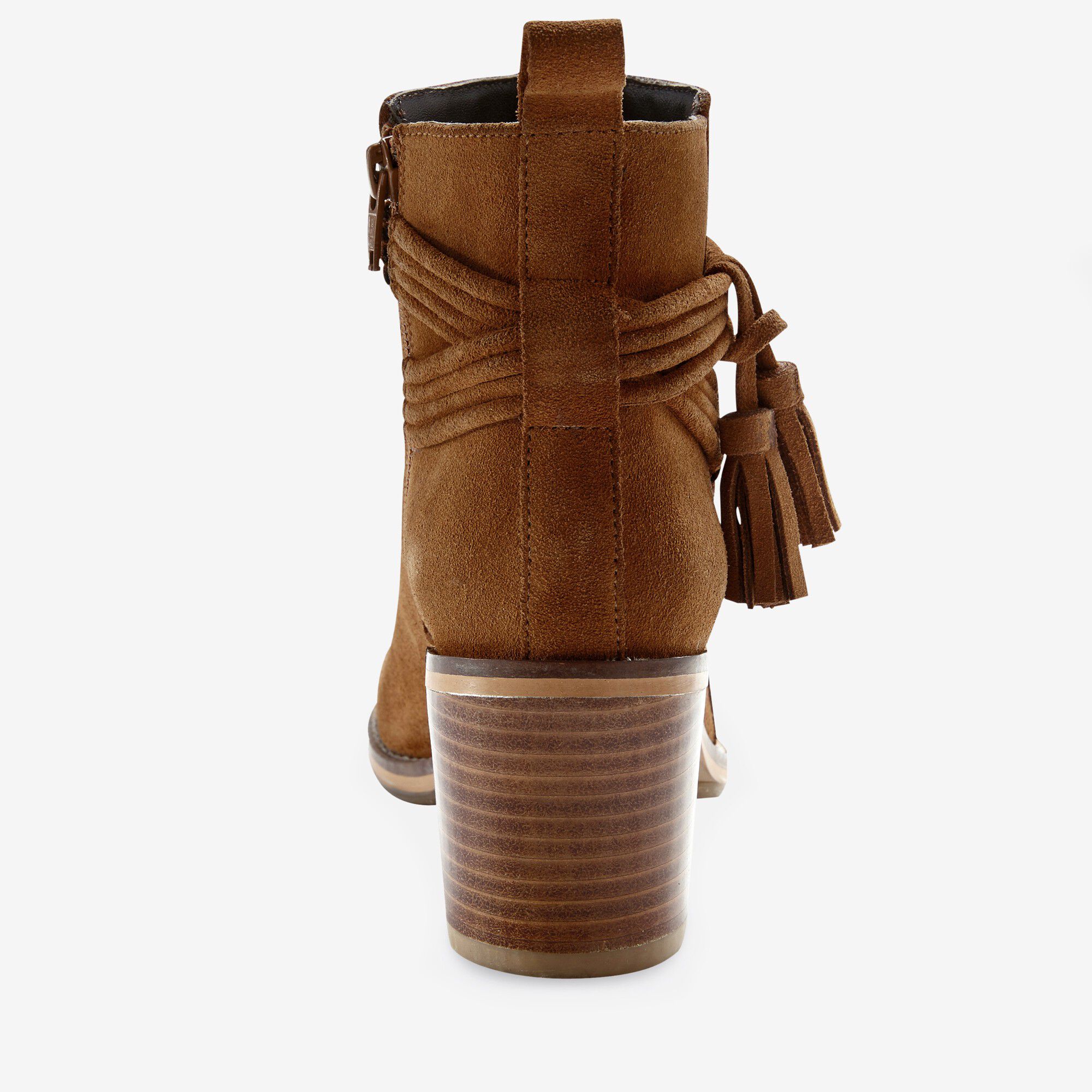 Boots en croûte de cuir à talon et pompons