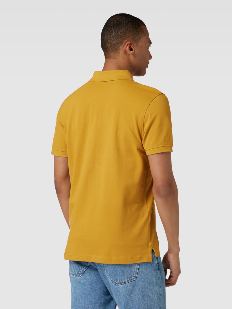 Poloshirt mit Label-Stitching in senfgelb