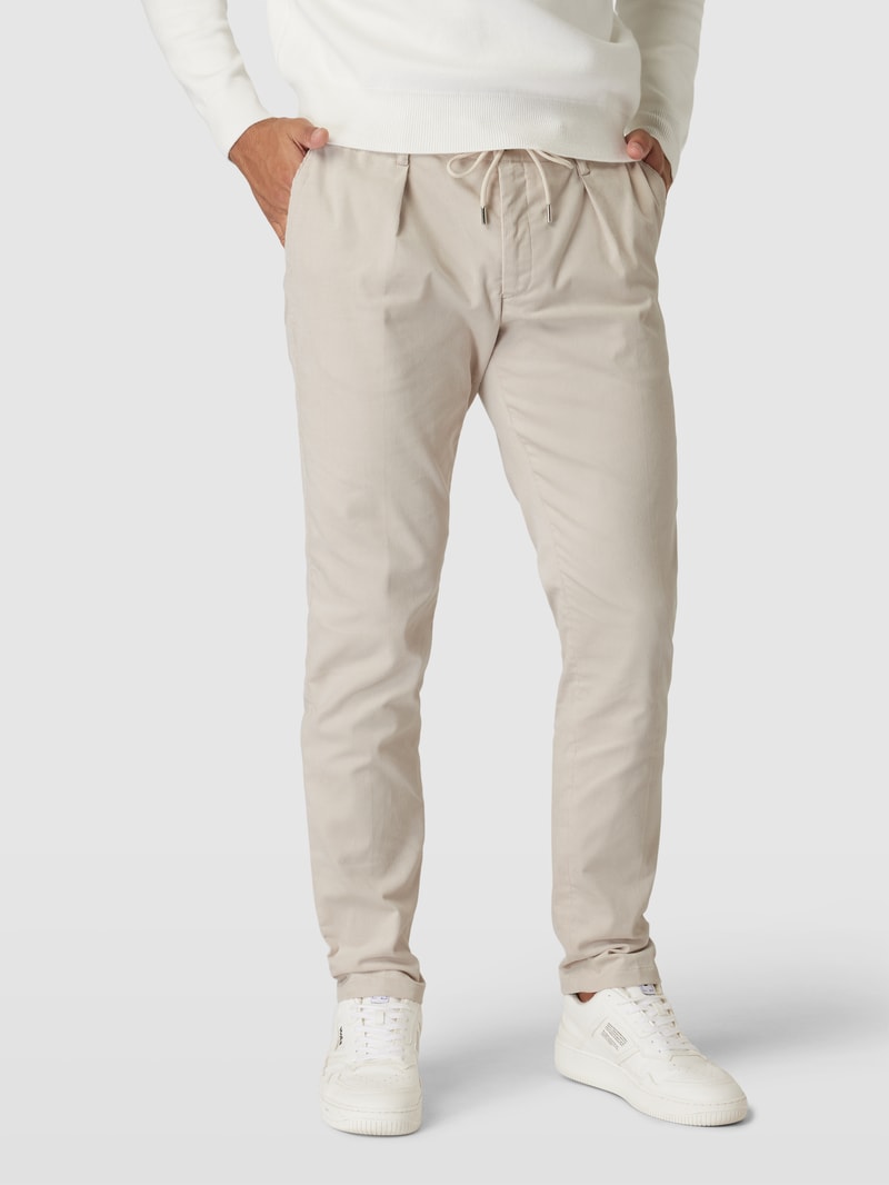 Chino mit Paspeltaschen in beige