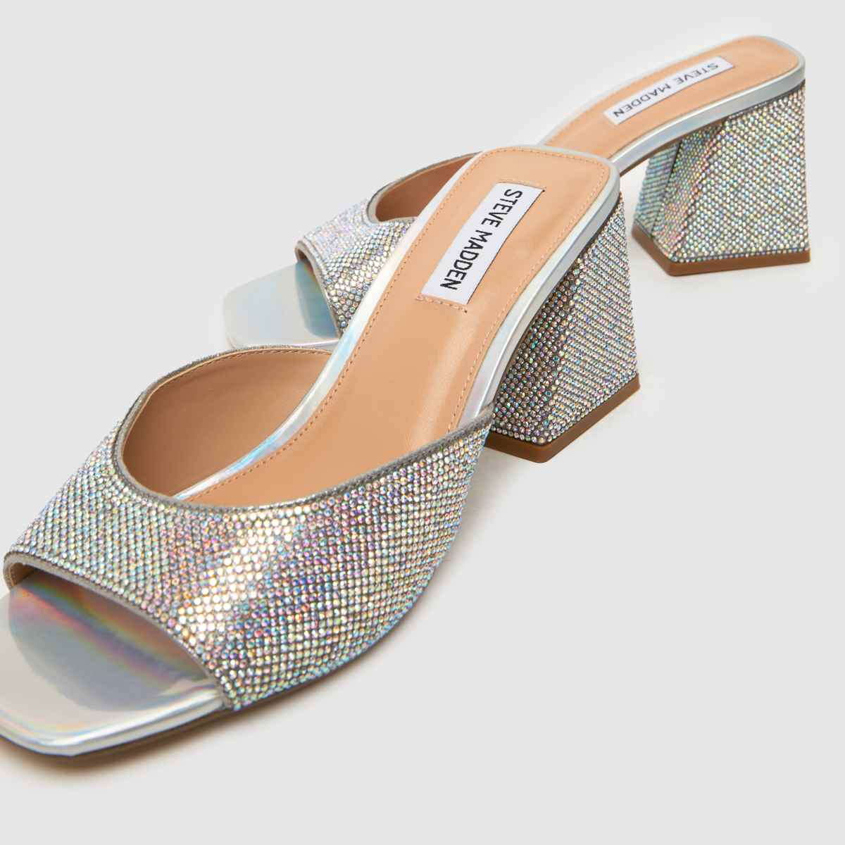 Steve Madden – Silverfärgade mules med hög klack och glödande klack