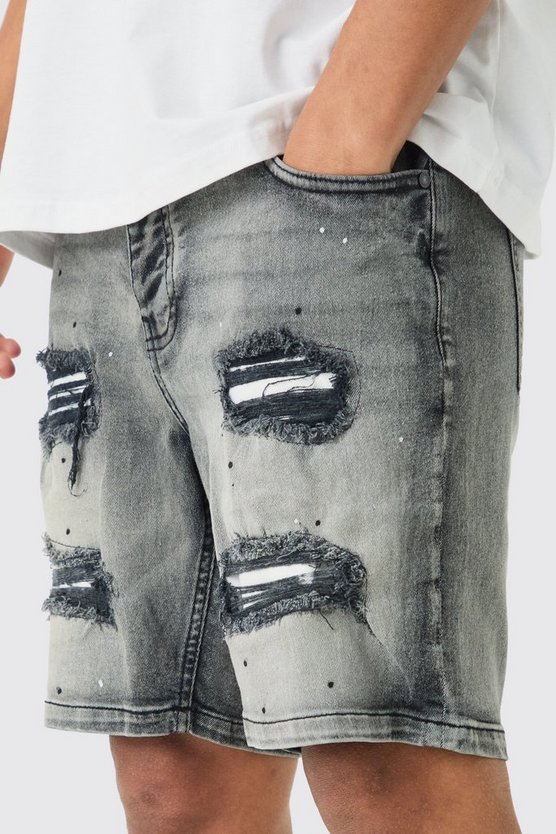 Skinny Stretch PU Jeansshorts mit Farbspritzern und Rissen