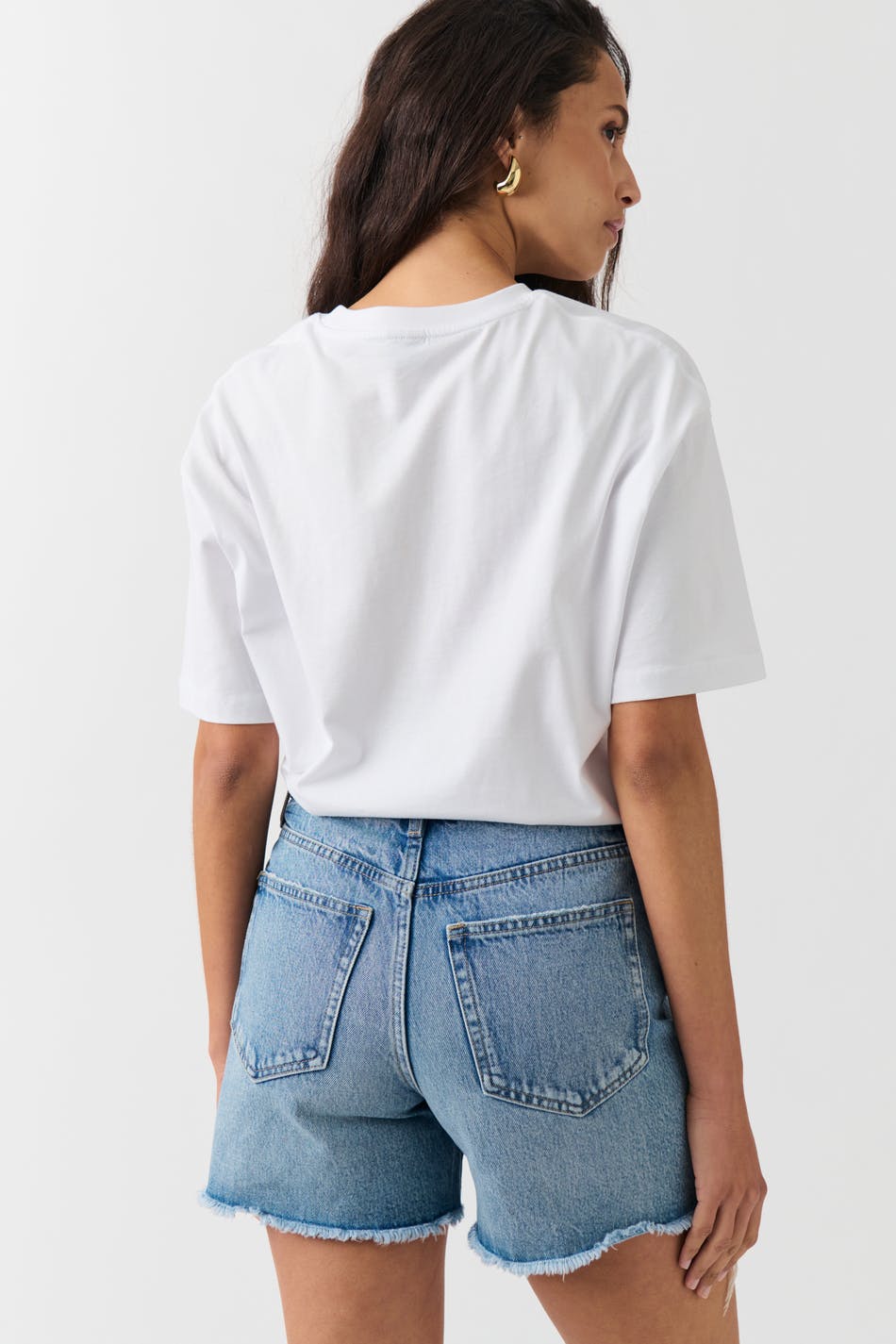 Distressed high denim shorts