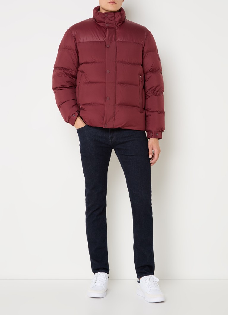 Jaqueta puffer Tommy Hilfiger com enchimento de plumas e capuz removível.