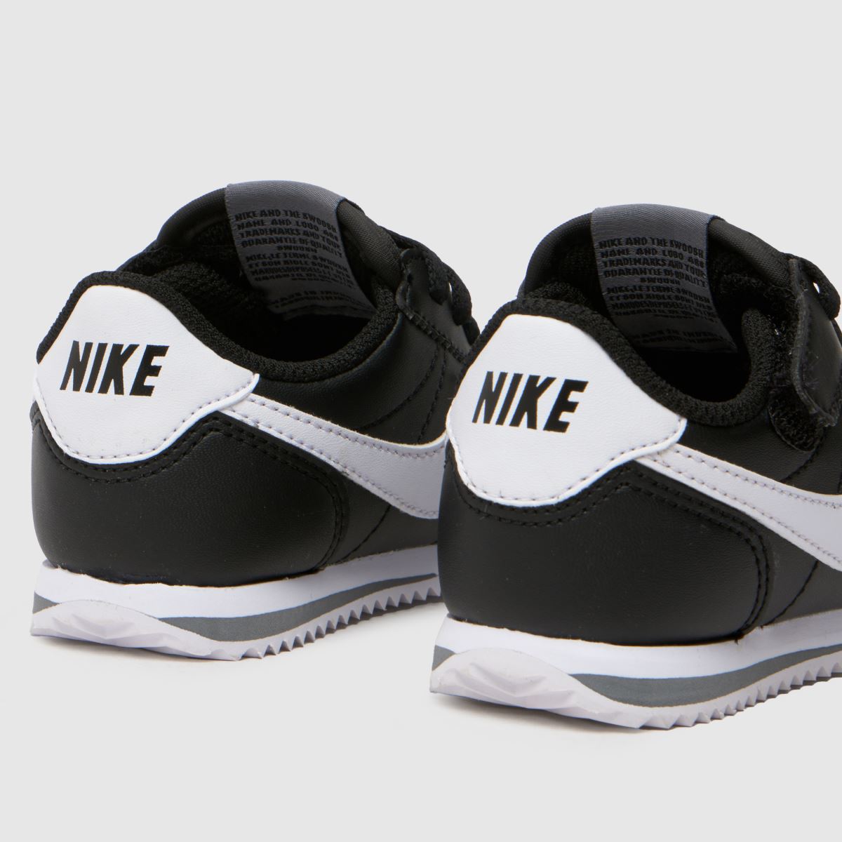 Nike svarta och vita Cortez småbarnsskor