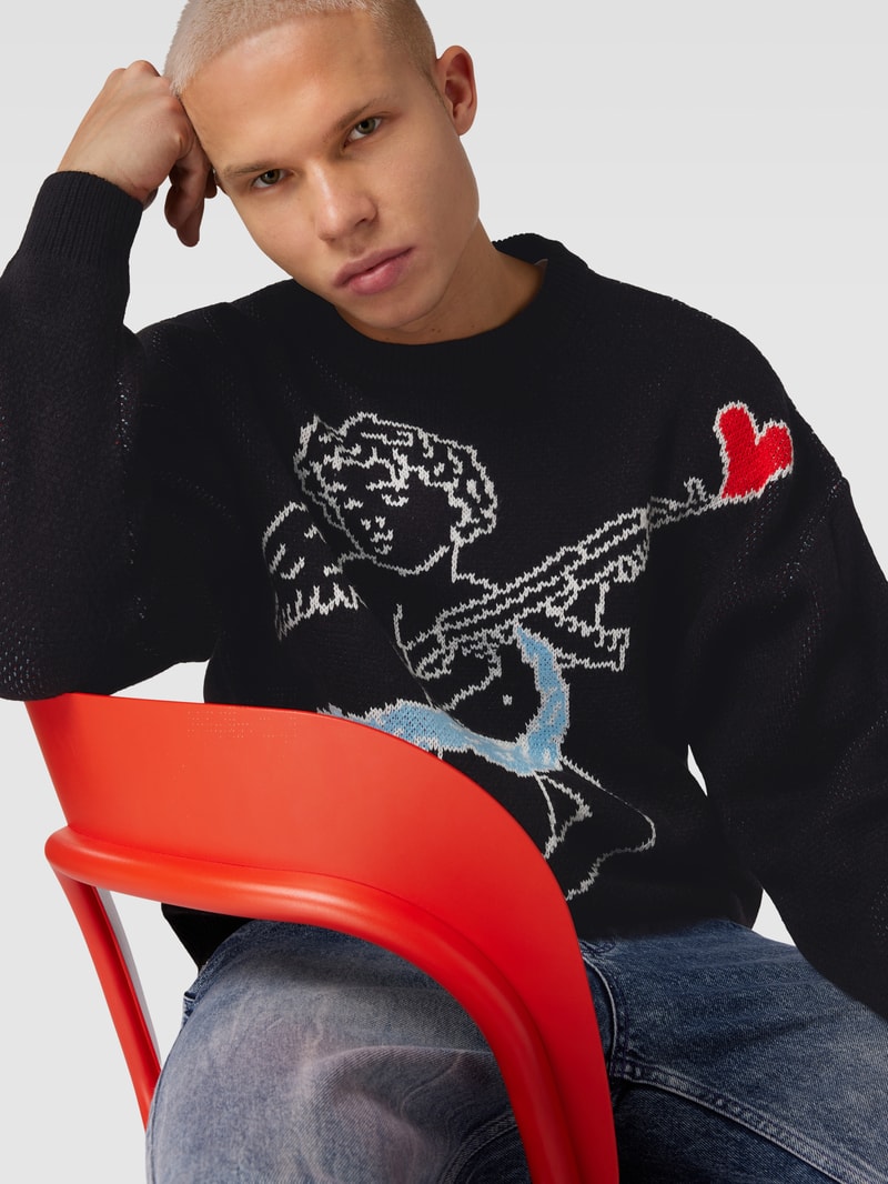 Strickpullover mit überschnittenen Schultern in schwarz