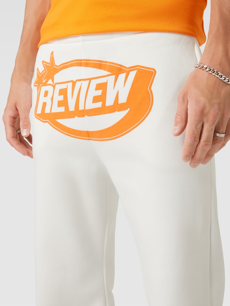 Sweatpants mit Label-Print in offwhite