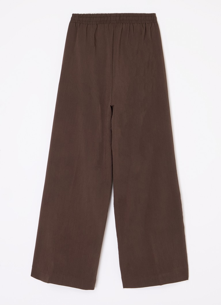 Pantaloni largi Sofie Schnoor cu buzunare laterale.