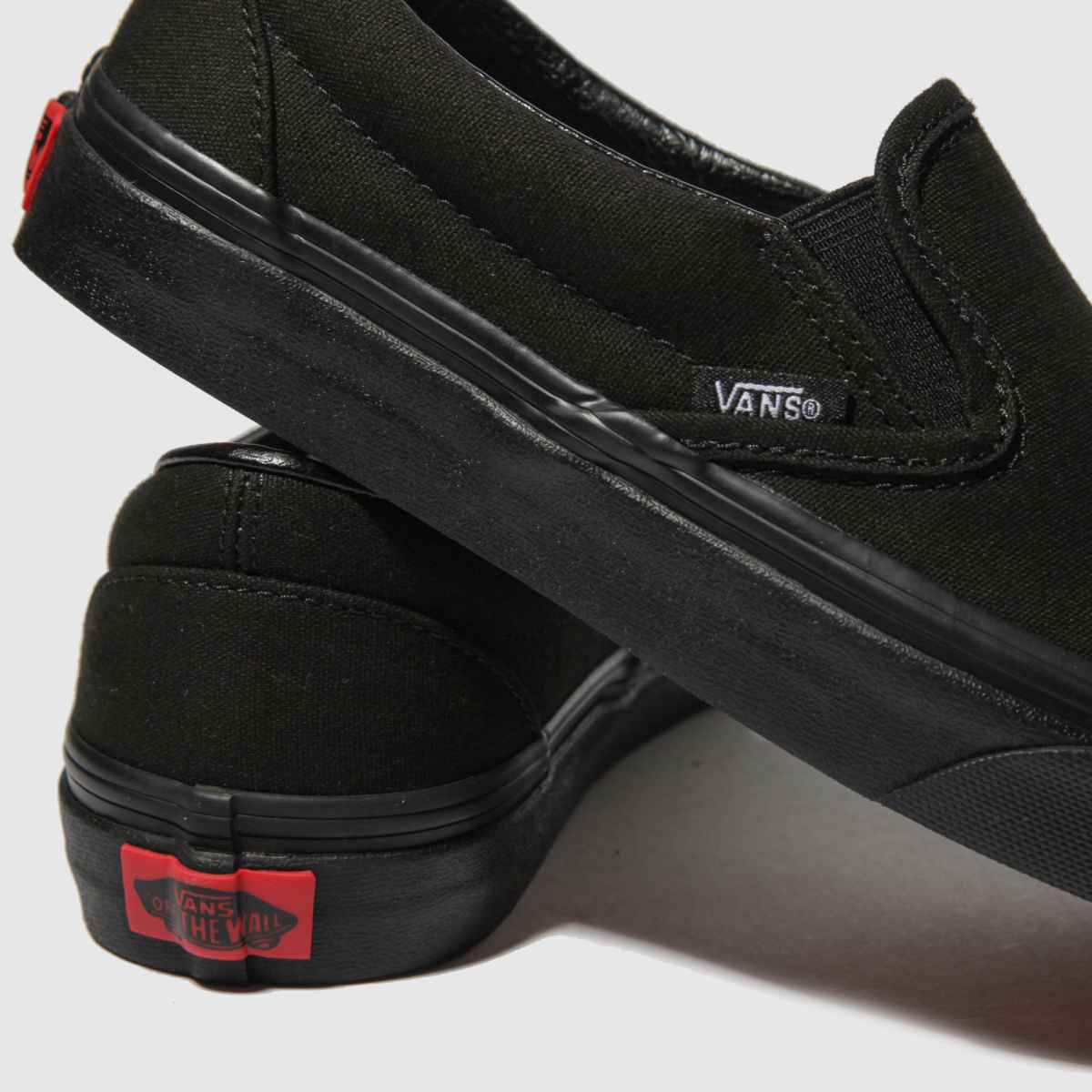 Vans – Svarta klassiska slip-on iii-sneakers