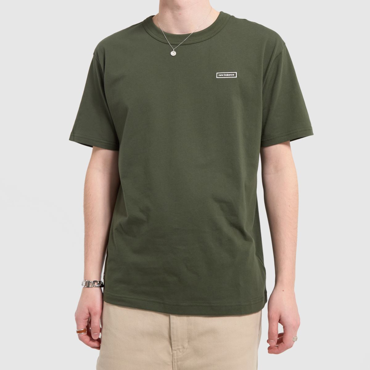 New Balance – Grön vintert-shirt med essentials-motiv