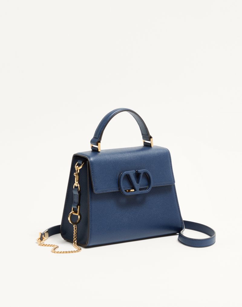 Bolsa Valentino Garavani Vsling pequena em couro de bezerro granulado.