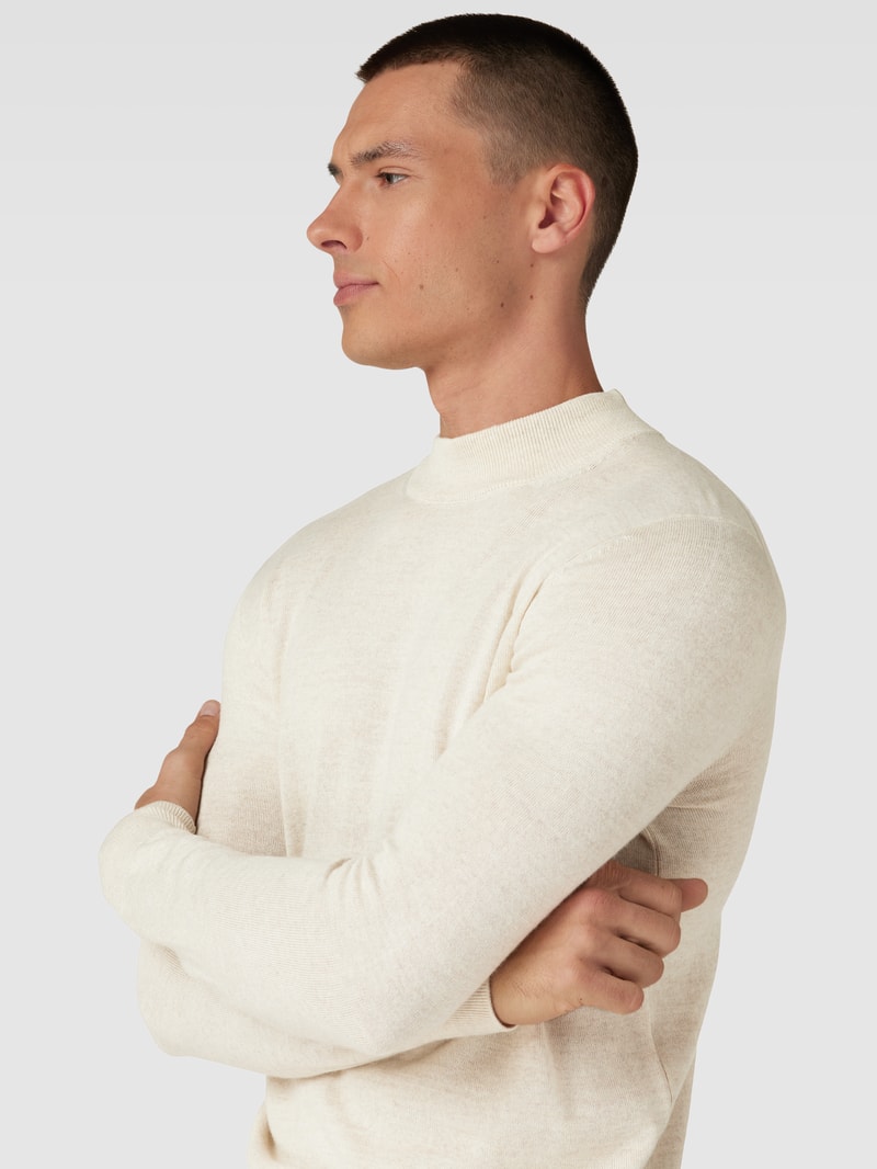 Strickpullover mit Rollkragen in ecru meliert