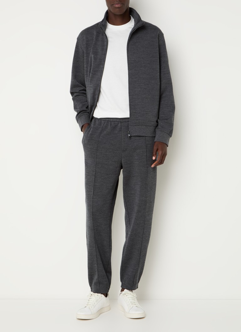 Pantaloni de trening Emporio Armani din amestec de lână, cu croială slim și buzunare laterale.