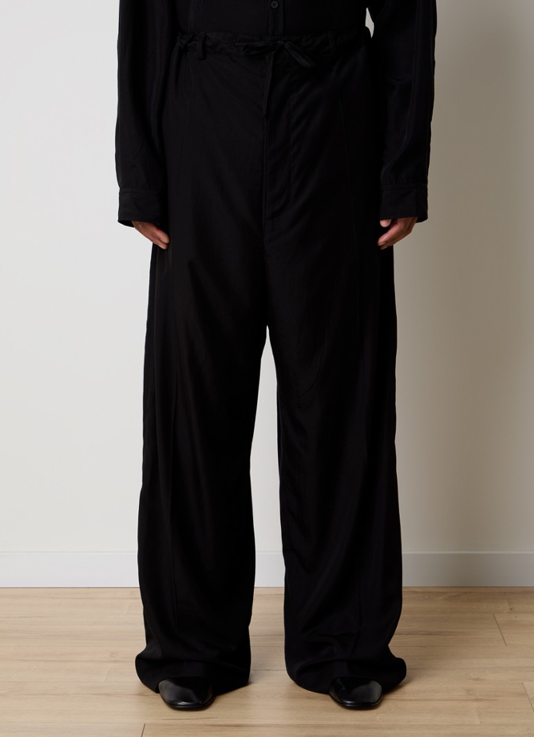 Pantaloni Balenciaga din lyocell cu croi larg și buzunare laterale