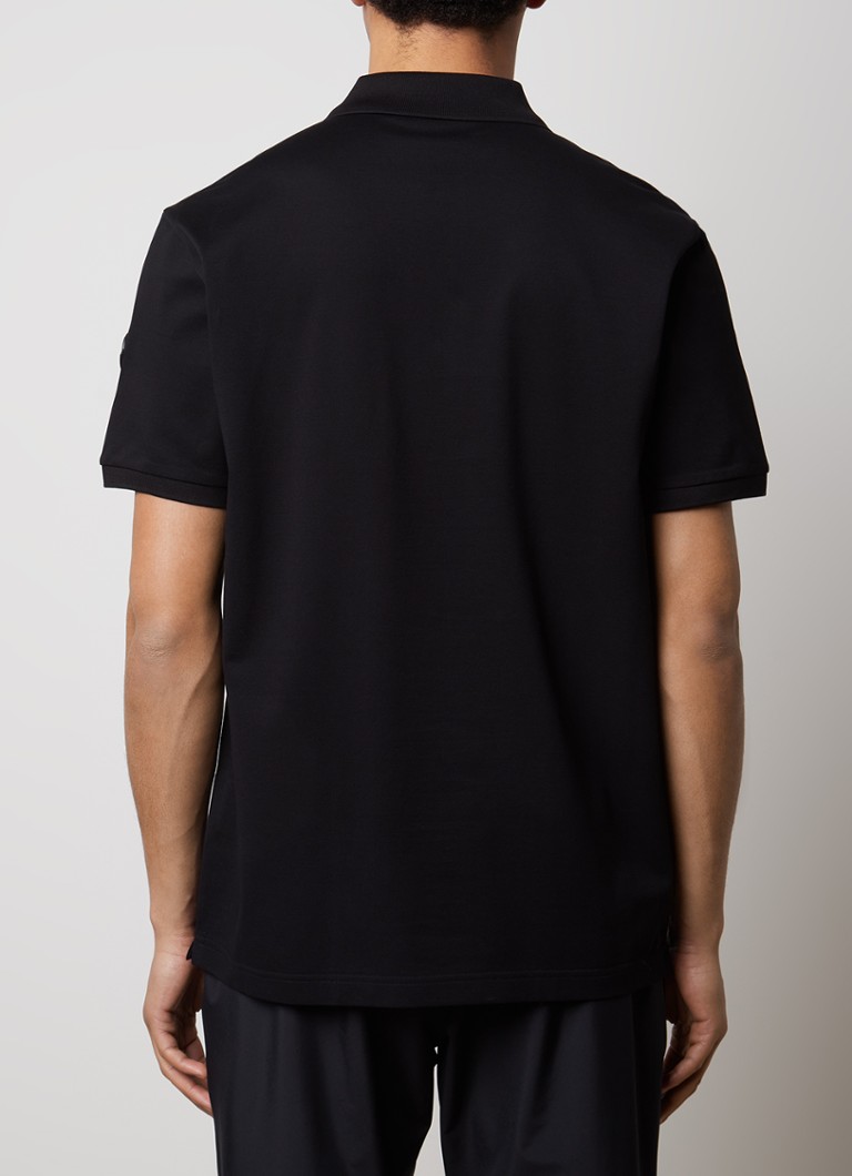 Tricou polo clasic Moncler din bumbac matlasat, cu închidere cu fermoar pe jumătate.