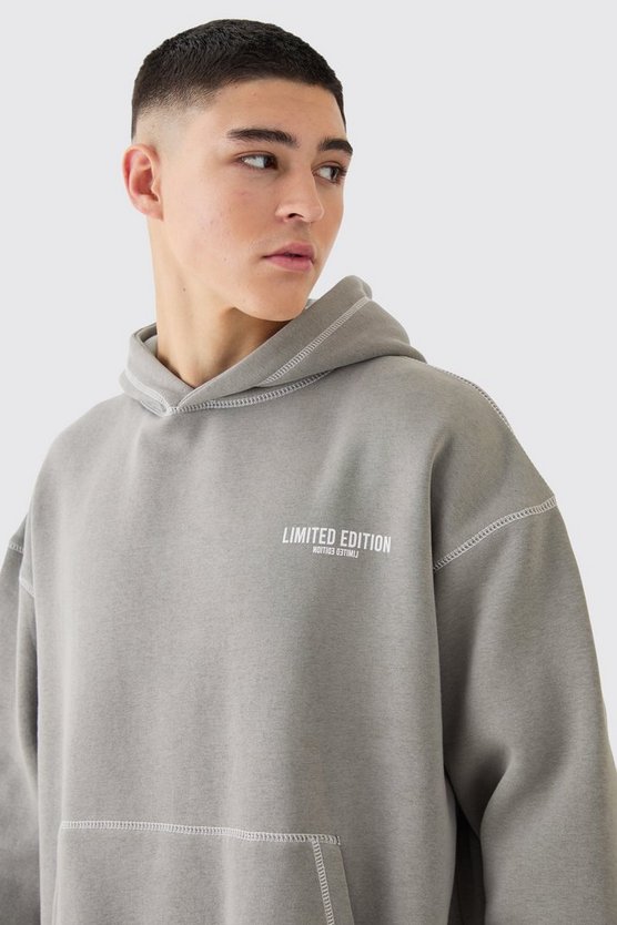 Kastige Oversize Limited Edition Trainingsoberteil mit Kontrast-Naht und Kapuze