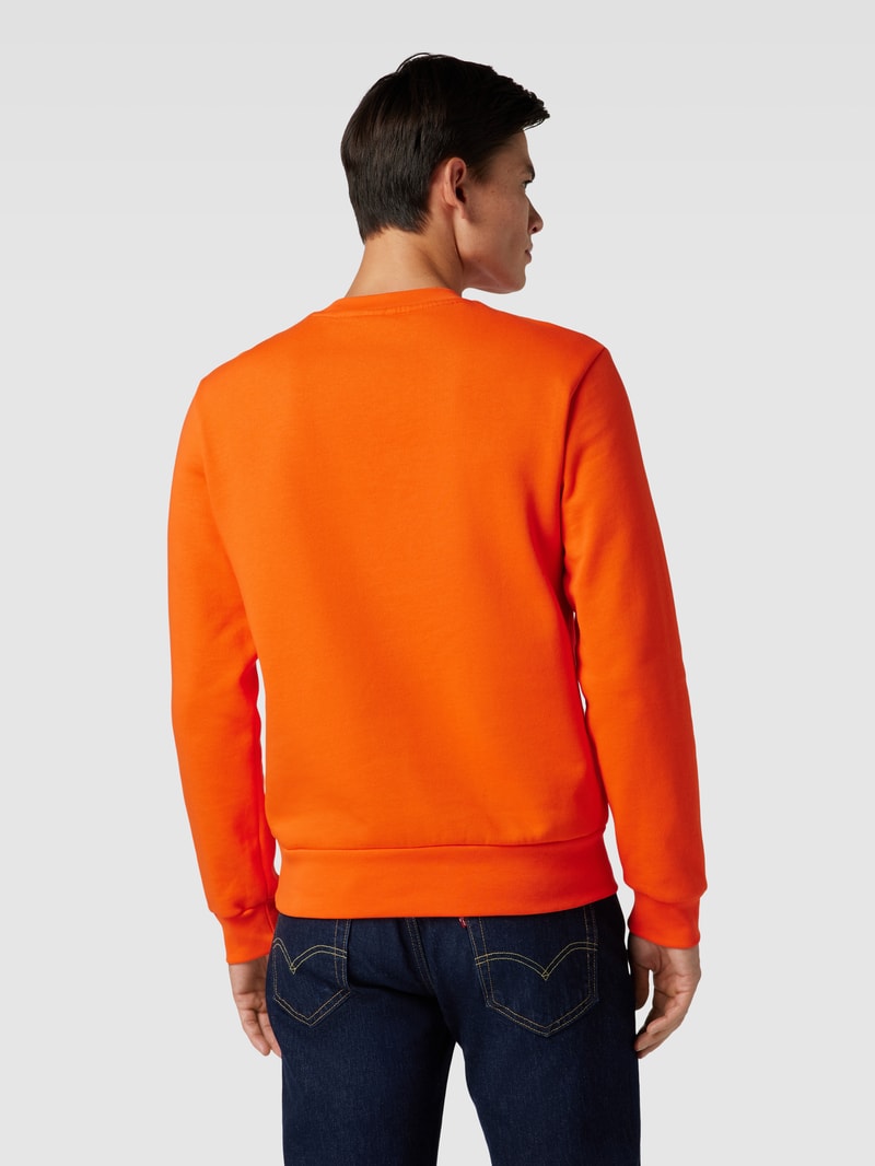 Sweatshirt in unifarbenem Design mit Label-Stitching in orange