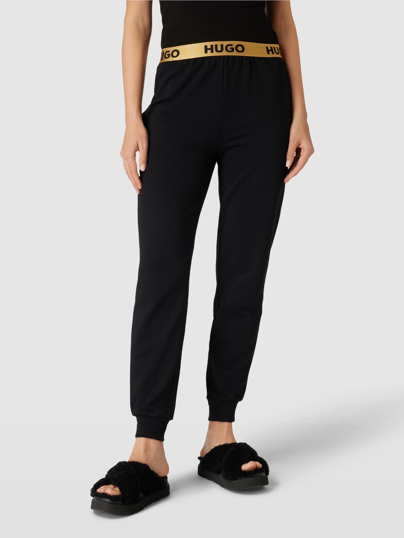 Stoffhose mit elastischem Logo-Bund in gold
