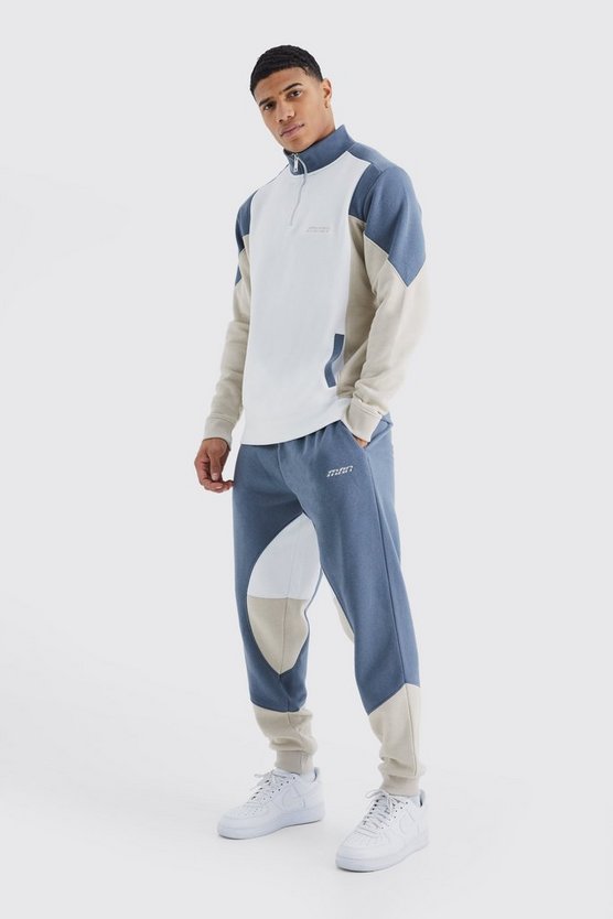 Man Colorblock Trainingsanzug mit 1/4 Reißverschluss und Trichterkragen