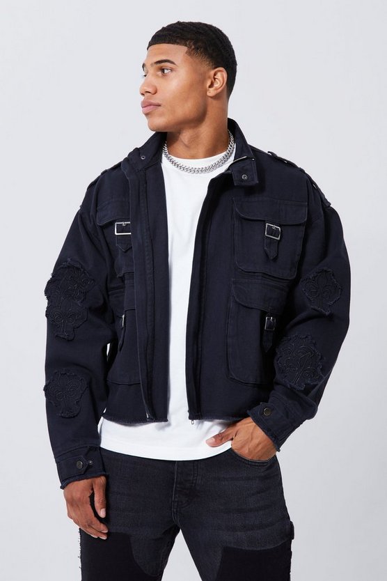 Kastige zerrissene Twill-Jacke mit Kreuz-Applikation
