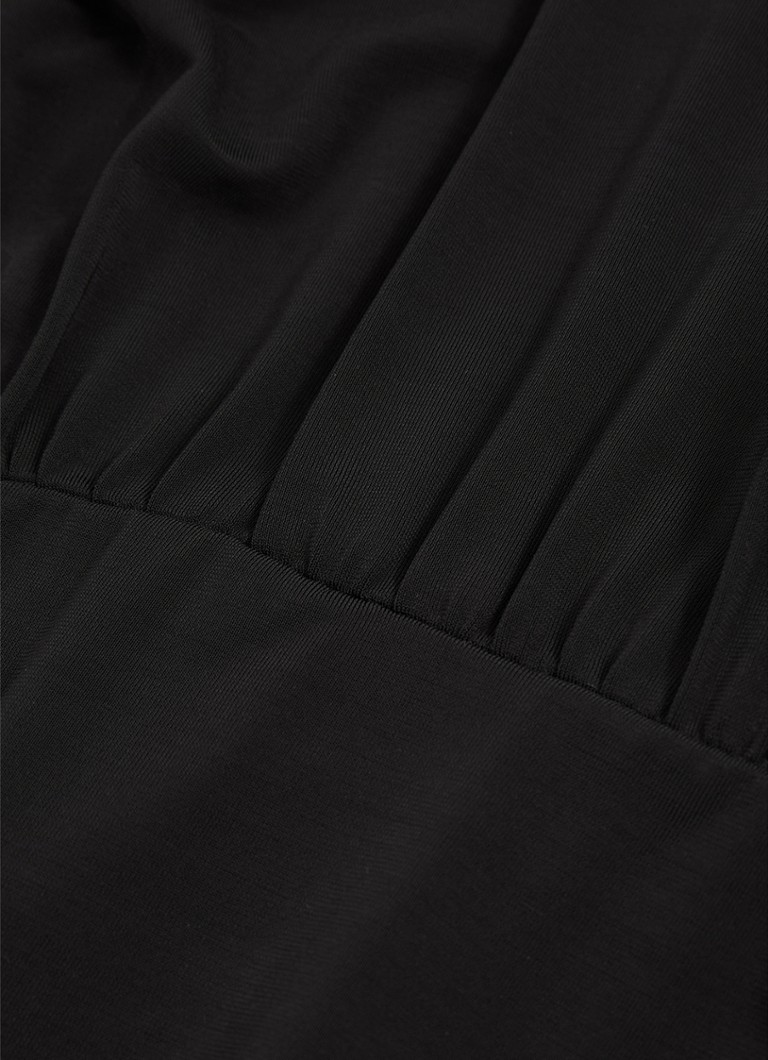 Top Reiss Adrienne con collo alto e dettagli traforati.
