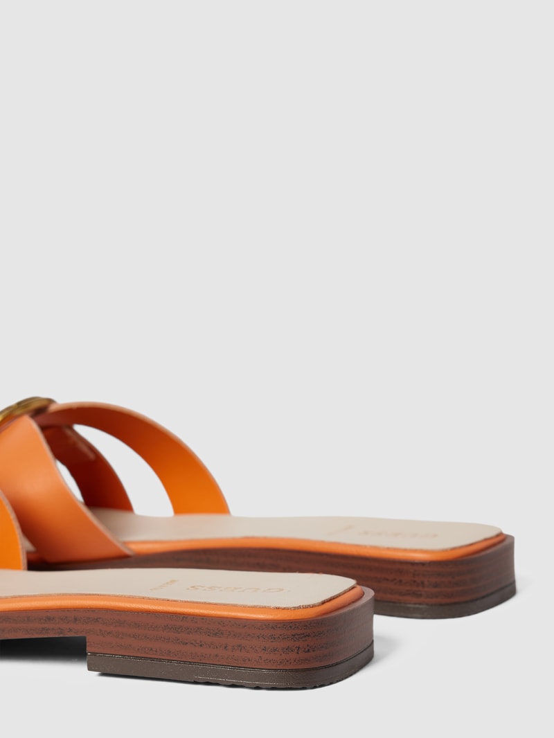Pantoletten aus Leder mit Label-Detail Modell 'SYMO' in orange