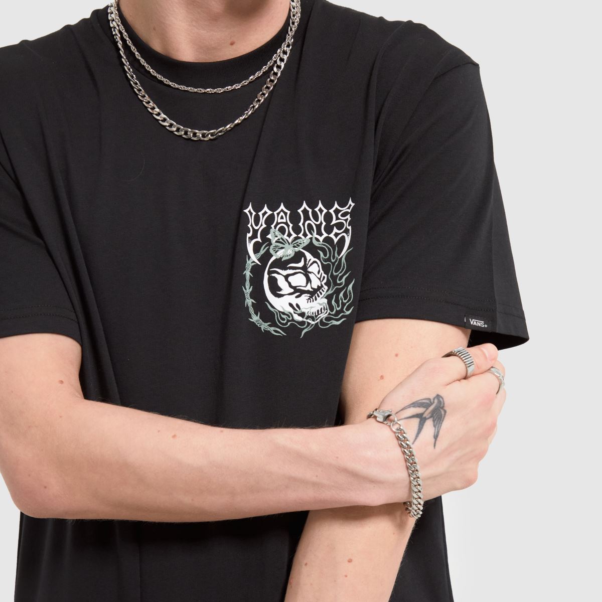 Vans – Svart och vit t-shirt med lucky streak-motiv