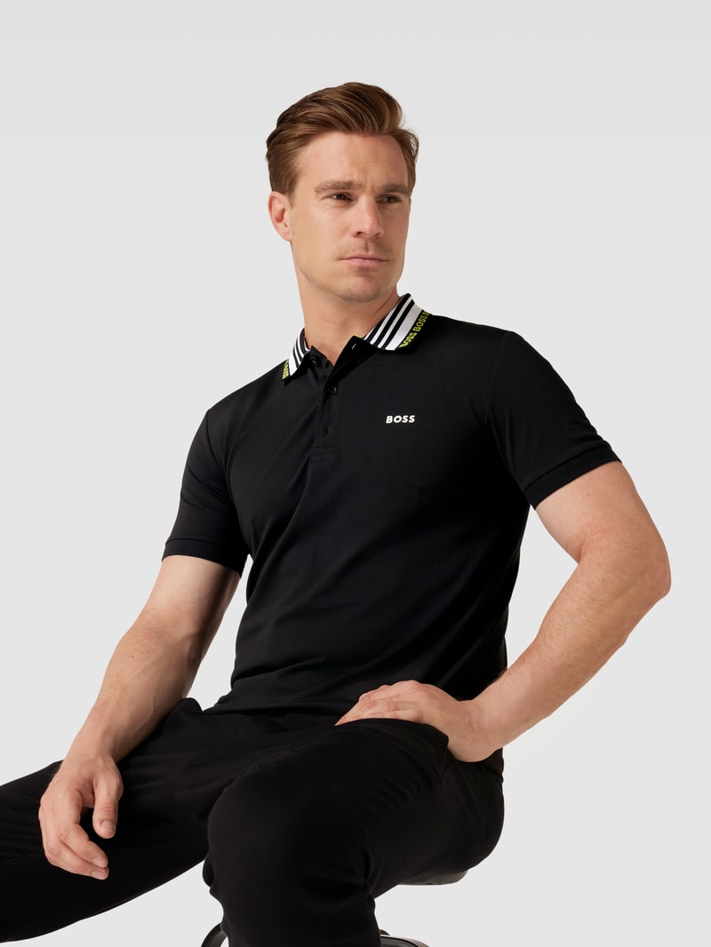 Poloshirt mit Label-Details Modell 'Paule' in schwarz