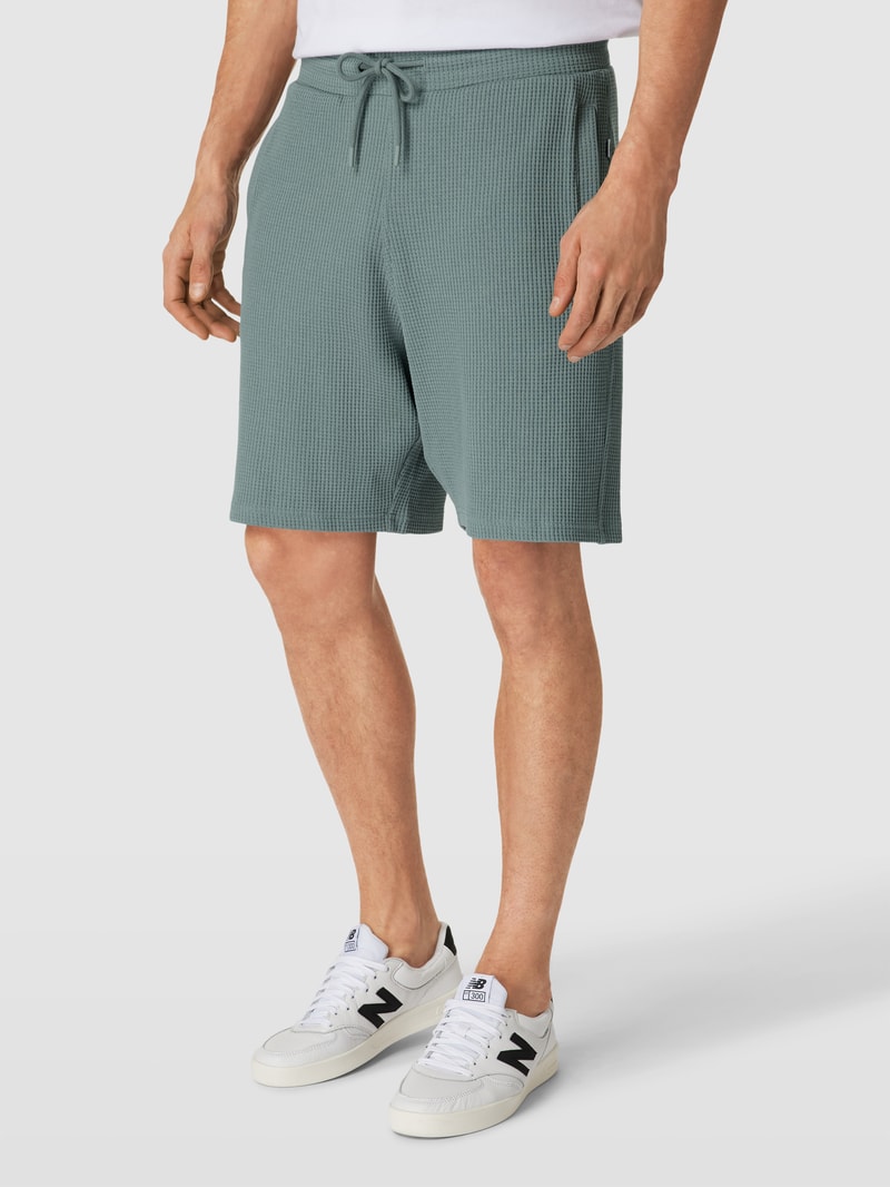 Shorts mit Strukturmuster in petrol