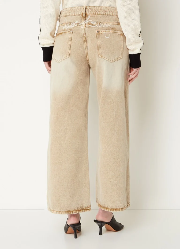 House of Sunny Sandblast mid waist wide leg jeans with colored wash and logo
