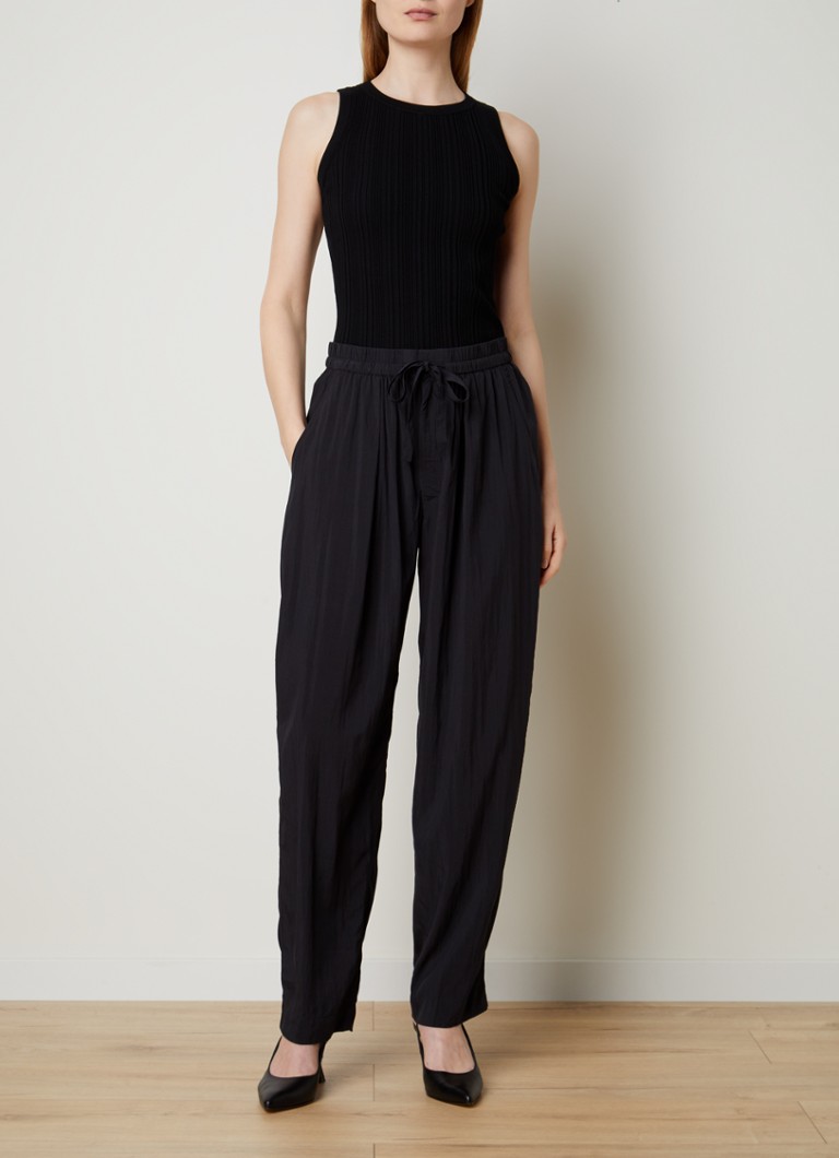 Pantaloni Hectorina a vita alta e gamba larga con cintura da annodare, firmati Isabel Marant.