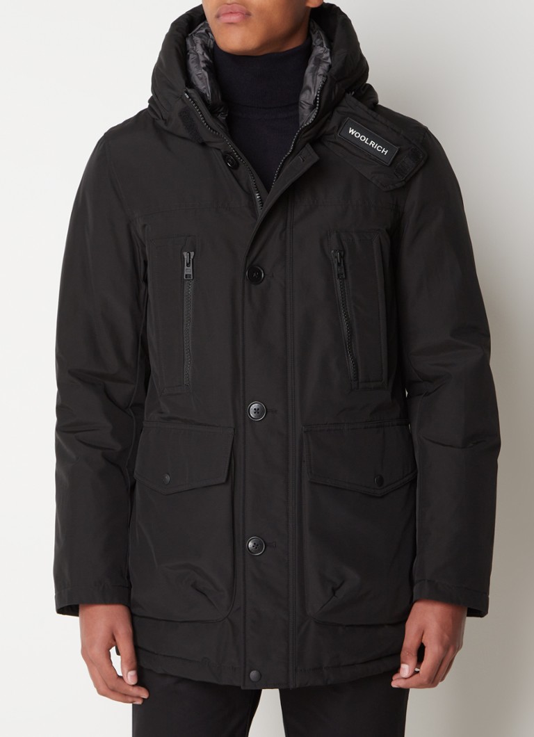 Prošívaná bunda Woolrich Ramar s péřovou výplní a kapsami s ventilkem