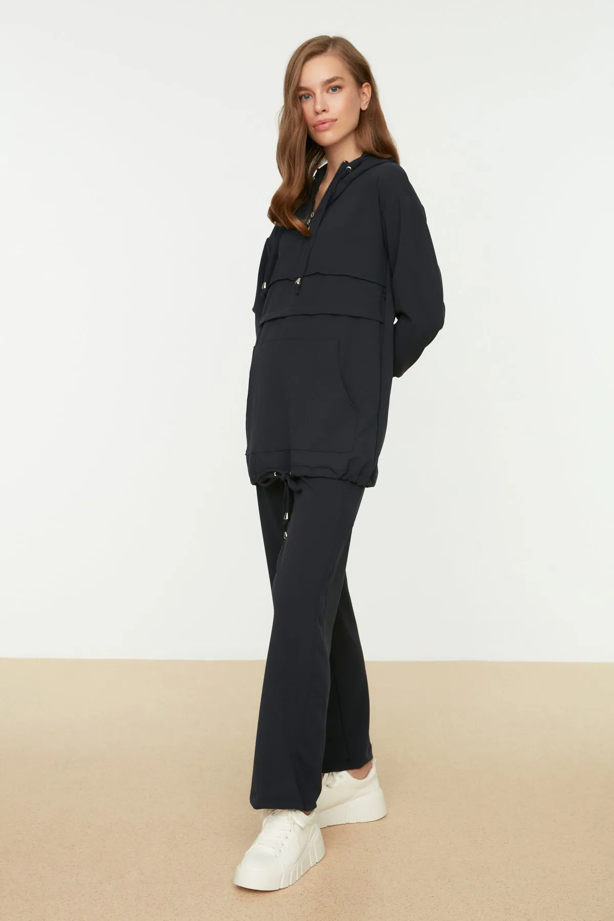 Trendyol Modest  Indigoblaues Strickset aus Tunika und Hose mit Kapuze und Reißverschluss TCTAW22US0094