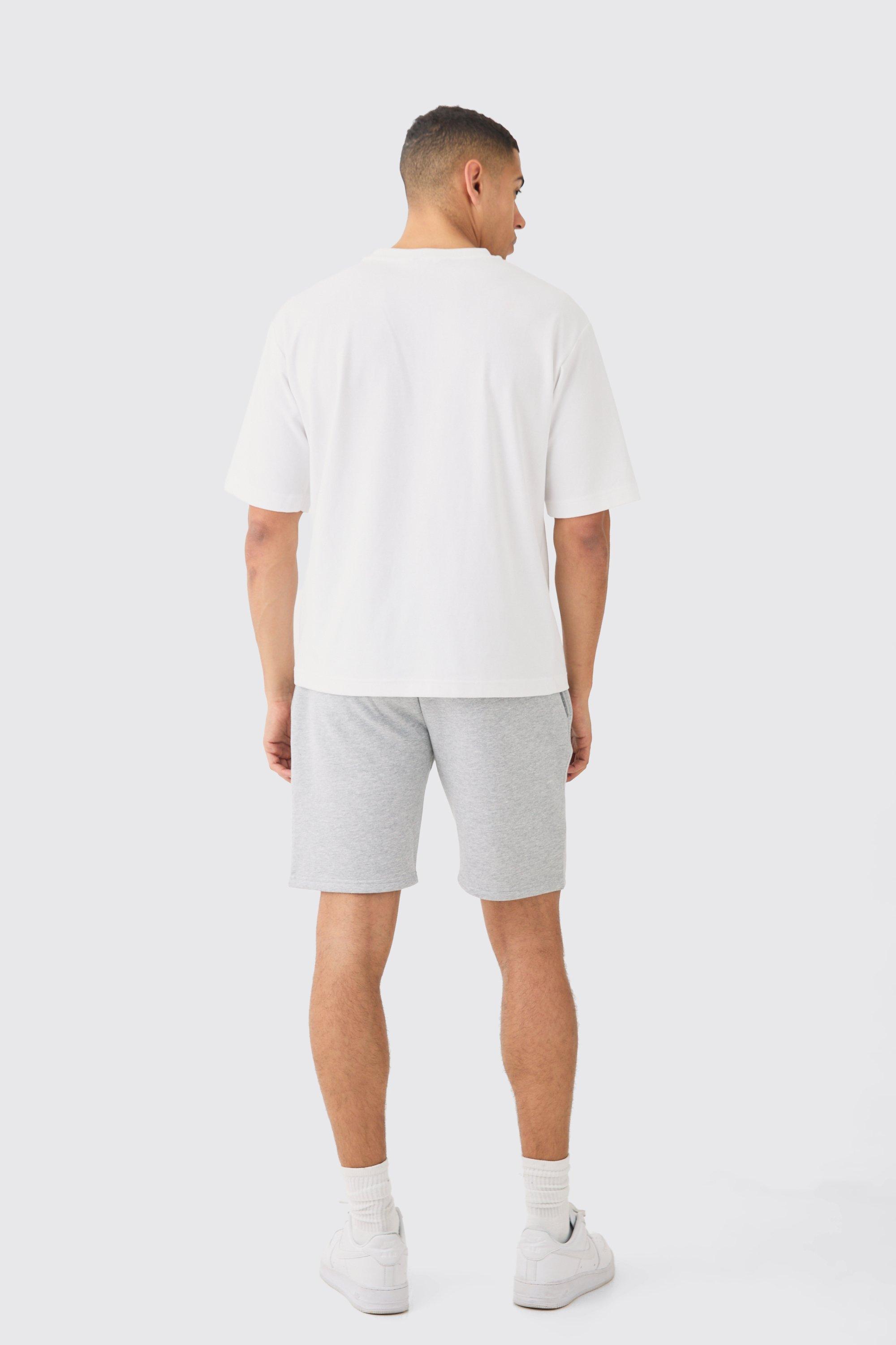 Lockere, mittellange Man Signature Shorts