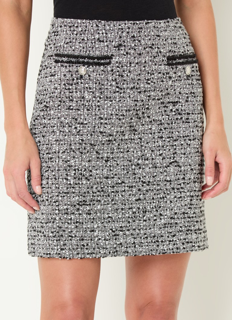 Minissaia Charlie da LKBennett com estampa tweed.