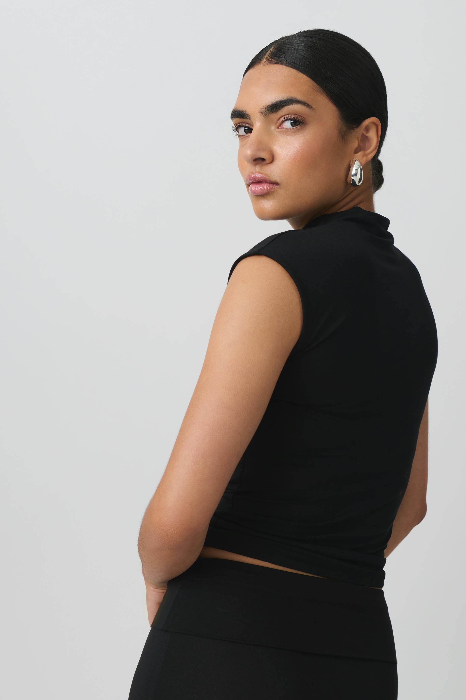 Soft touch funnel neck top